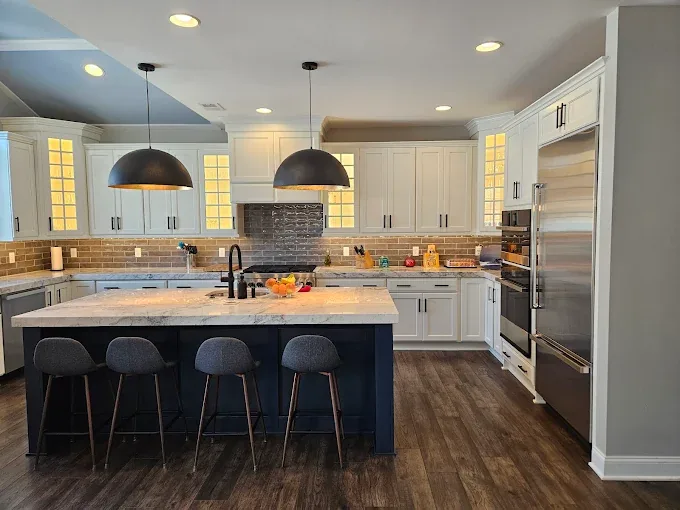 Spotless luxury kitchen with gleaming hardwood floors cleaned by Nina's Cleaning Service in Bernville PA