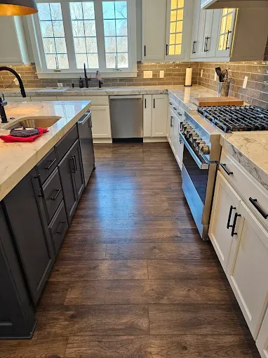 Spotless kitchen floor cleaned by Nina's Cleaning Service